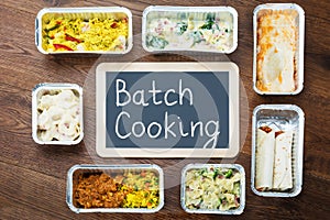 Batch Cooking Text Written On Slate With Take Away Dishes