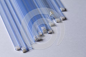 Batch of Empty Tubes for Surface Mount Components in Microelectronics Industry Production