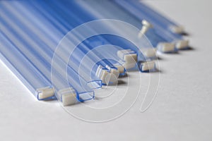 Batch of Empty Tubes for Surface Mount Components in Microelectronics Industry Production