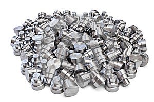 Batch of shiny steel cnc turned parts isolated on white background