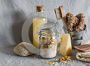 Bath accessories - homemade sea salt with calendula, natural shampoo, brush, washcloth, pumice, homemade oat soap. Health, beauty photo