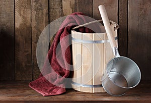 Bath accessories: wooden bucket and ladle.