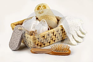 Bath accessory, various spa and beauty threatment products, body scrub in wooden basket. photo