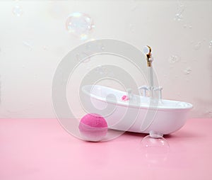 Bath bombs in bathroom, soap bubbles, bathtube miniature