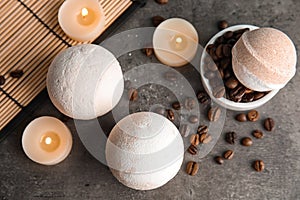 Bath bombs, coffee beans and candles on table