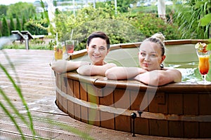 Bath in a garden tub. Rest in a holiday resort. Summer getaway.