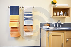 bath and hand towels in a color-coordinated display