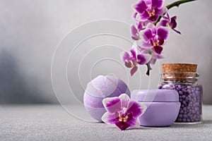 Bath products for wellness and spa with purple orchid flowers