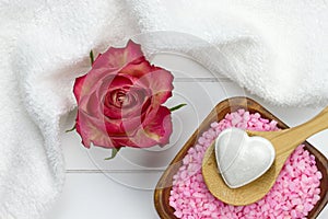 Bath salt in bowl and heart shaped bath fizzer