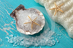 Bath salt in a shell and starfishes