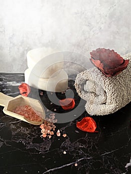 Bath salt and towel. Spa care, cosmetic accessories