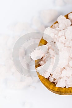 Bath salt on a wooden spoon