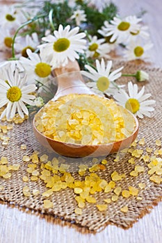 Bath salt on wooden spoon