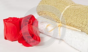 Bath soap in the form of roses and towels for a relaxing