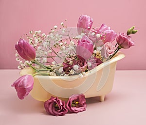 Bath with spring flowers, abstract spa and take a fragrant bath composition