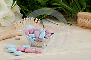 Bath Time color tablets for kids on wood background