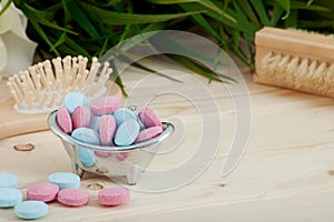 Bath Time color tablets for kids on wood background