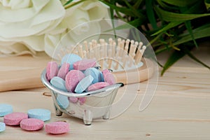 Bath Time color tablets for kids on wood background