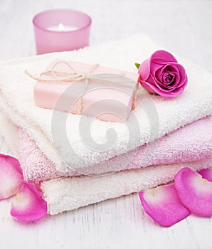 Bath towels and soap with pink roses