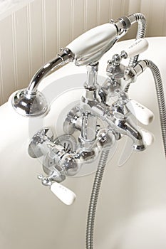 Bath tub faucet