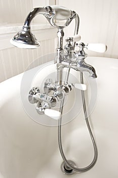 Bath tub faucet