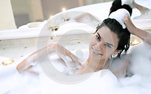 Bath in a whirlpool hot tub jacuzzi.