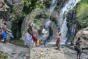 Bathers cool off at the base of Ella Waterfall near Tissamaharama in Sri Lanka.