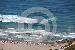 Bathers on the sandy beach of the Algerian coast photo