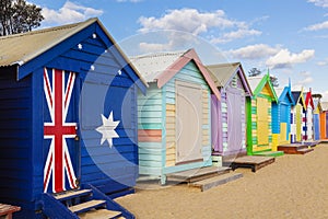 Bathing boxes in a beach with copyspace