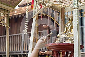 Bathing the Buddha statue in songkran festival 2022