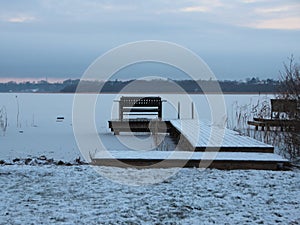 Bathing Pier with Bench in winter morning