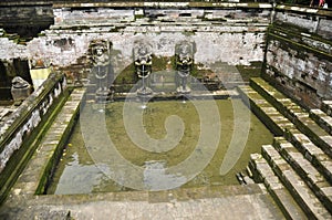 Bathing temple figures or holy water fountain of Goa Gajah or Elephant Cave significant Hindu archaeological site for travelers