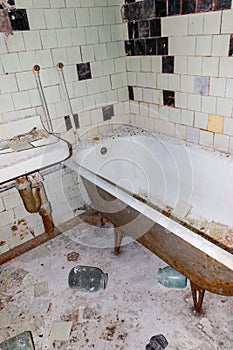 Bathroom of abandoned apartment in ghost town Pripyat in Chernobyl Exclusion Zone, Ukraine