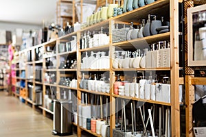 Bathroom accessories on shelving in household goods store