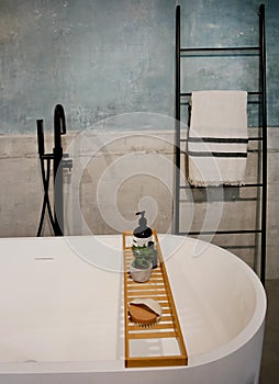 Bathroom with bathtub and hygiene items