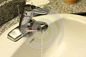 Bathroom Faucet with flowing water