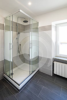 Bathroom with gray tiles and nobody inside