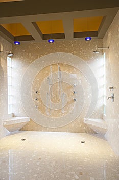 Bathroom With His And Hers Shower Heads photo