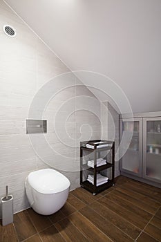 Bathroom with inclined wall photo