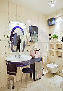 Bathroom interior with blue wash stand