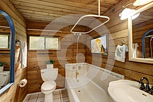 Bathroom interior in a luxurious log cabin.