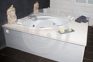 Bathroom with jetted bathtub and bubbling bath photo
