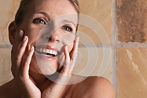 Bathroom, mature or happy woman with skincare, beauty or face cosmetics for treatment or confidence. Thinking, tile or