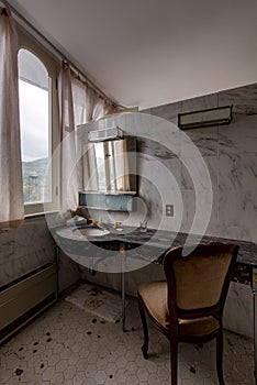 Bathroom with Mirror and Fancy Chair - Abandoned Nevele Resort - Catskill Mountains, New York