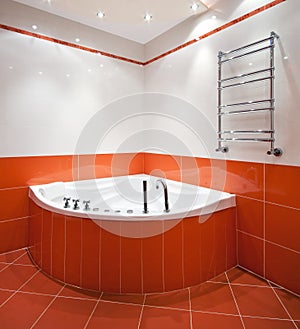 Bathroom in orange and white colors