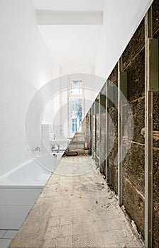 Bathroom before and after renovation - home refurbishment concept photo