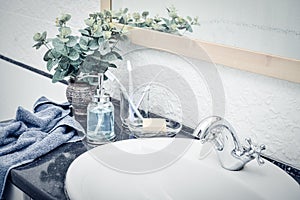 Bathroom set with toothbrushes, towels and soap