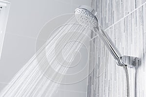 Bathroom shower head spraying water