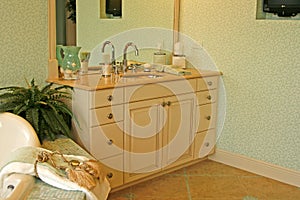 Bathroom sink and cabinet