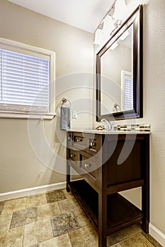 Bathroom vanity cabinet with drawers and mirror photo